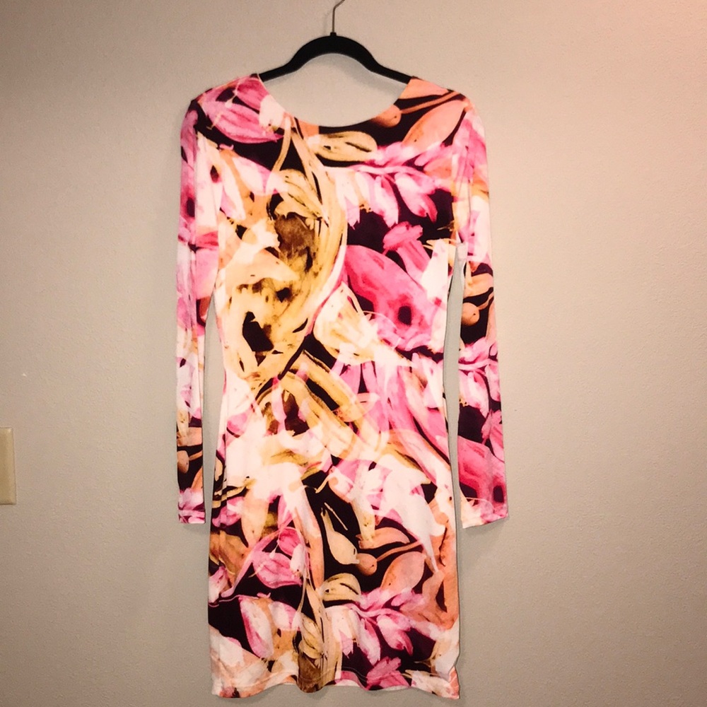 Stunning Long Sleeved, Low Back Mini Dress